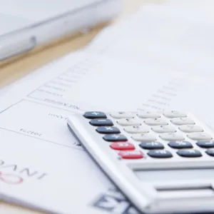 Calculator and financial paperwork